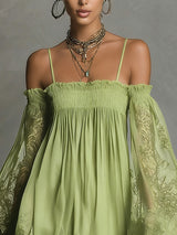 Noemi | Mini dress in navy blue chiffon with off-the-shoulder neckline, lace trim, and sheer sleeves | The Bellemont Sisters 
