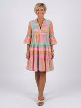 Maelle | Geometric Print V Neck Tiered Knee Length Dress – Pink | The Bellemont Sisters Australia