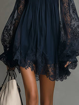 Noemi | Mini dress in navy blue chiffon with off-the-shoulder neckline, lace trim, and sheer sleeves | The Bellemont Sisters 