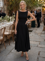 Corane | Sleeveless Crew Neck Fitted Bodice Midi Dress | The Bellemont Sisters Australia
