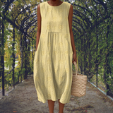 Kira | Elegant sleeveless dress with pockets – Light Yellow | The Bellemont Sisters Australia