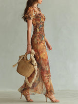 Viola | Long orange chiffon dress with bohemian-style oil painting print | The Bellemont Sisters Australia