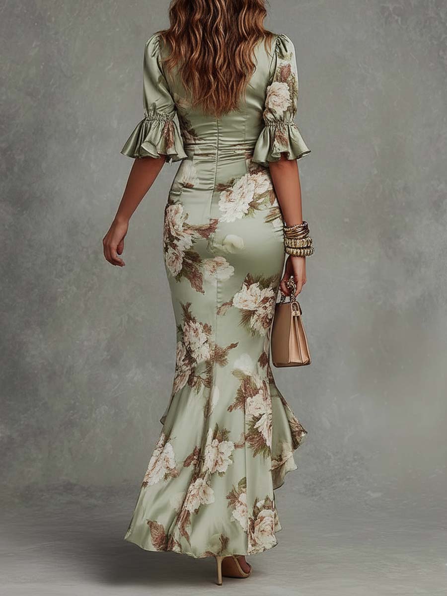 Anna - Asymmetrical long dress in green satin with V-neck, flared puff sleeves, and floral pattern | The Bellemont Sisters Au